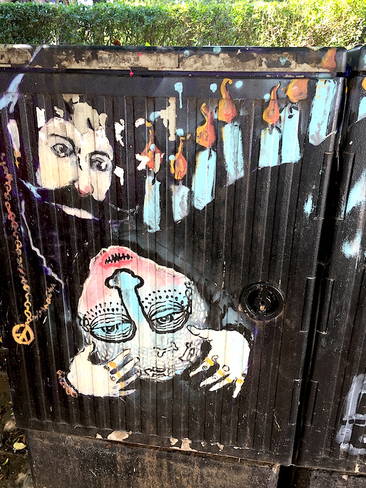 Street art of two strange men